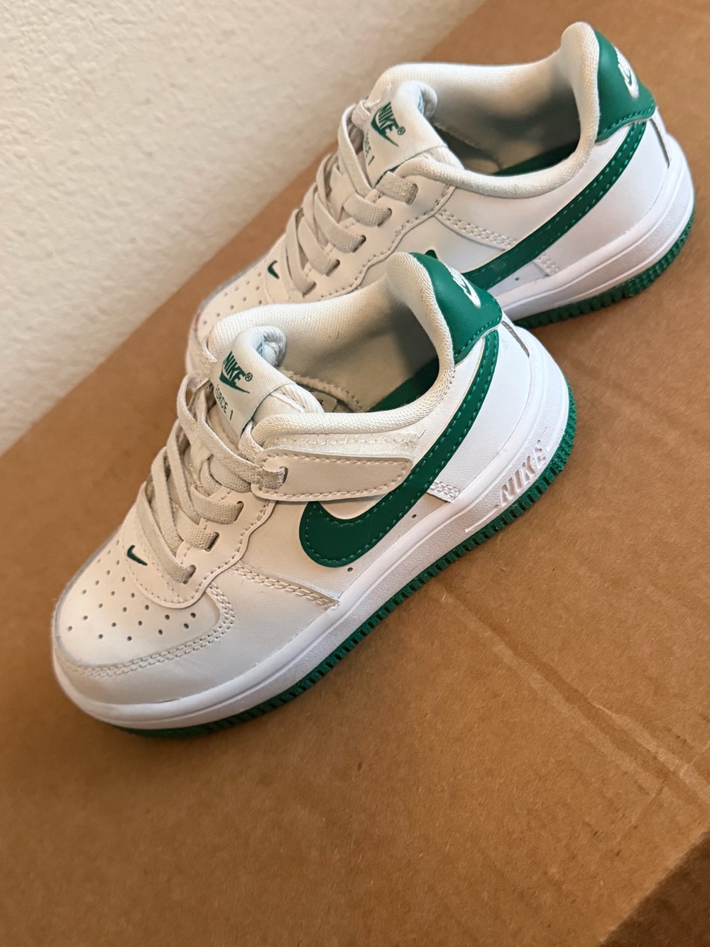Nike White Leather Sneakers with Green Swoosh
